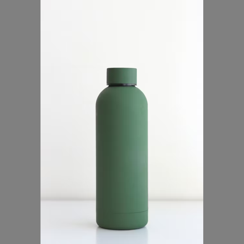 Water bottle being drunk from by a female runner